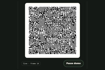 A QR code in the running qrp2p demo, beside a pause button.