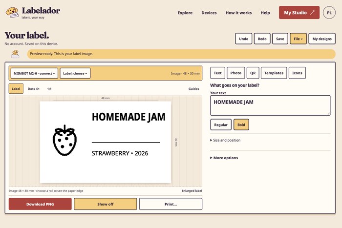 A black-and-white jam label with a strawberry and the words “Homemade jam”, shown in Labelador next to the text box.