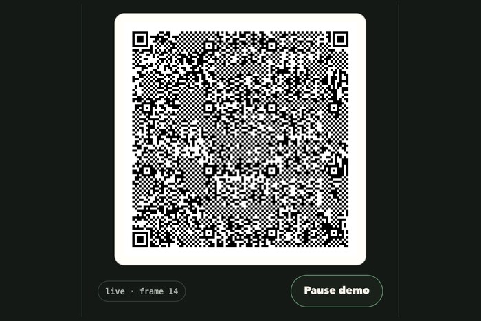 A screenshot of qrp2p.net: a QR code on a dark screen and a badge reading "live · frame 14".